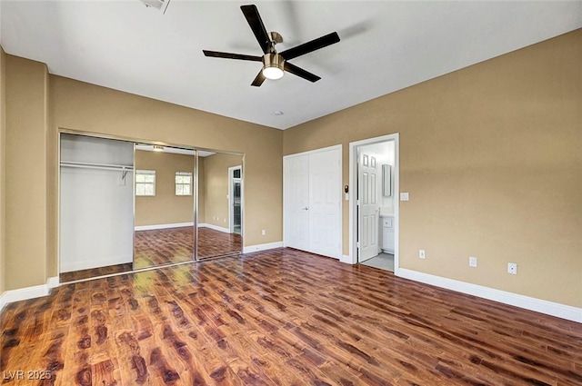 229 N Buteo Woods Ln, Las Vegas, NV 89144 - unfurnished bedroom with wood finished floors, ensuite bathroom, and a ceiling fan