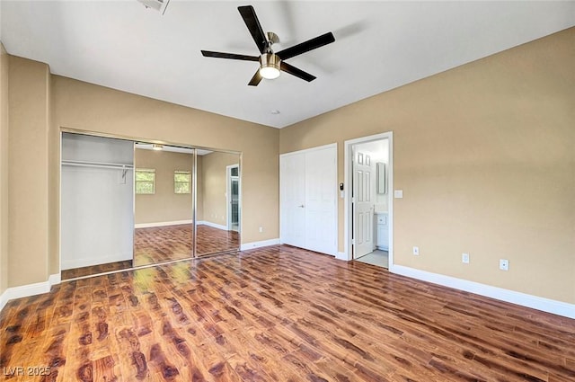 229 N Buteo Woods Ln, Las Vegas, NV 89144 - unfurnished bedroom with wood finished floors, a closet, connected bathroom, and a ceiling fan