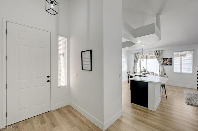 201 Crown Imperial St, Henderson, NV 89074 - entrance foyer with light wood-style floors and a high ceiling