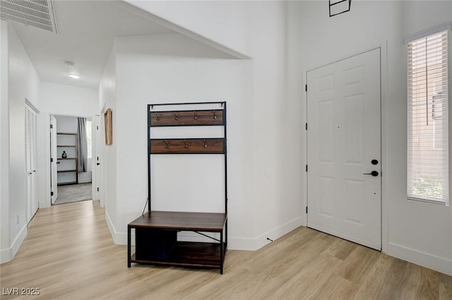 201 Crown Imperial St, Henderson, NV 89074 - foyer with light wood finished floors and plenty of natural light