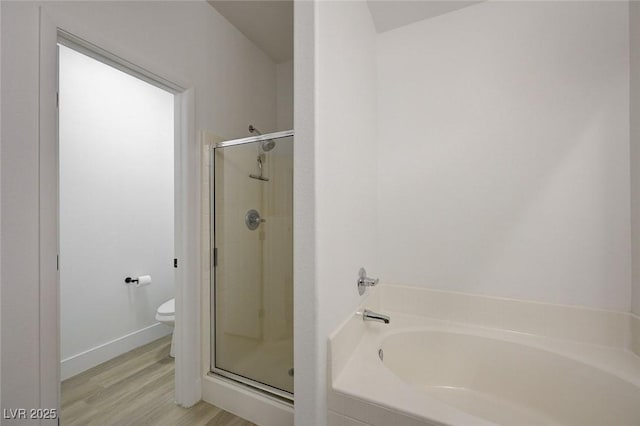 201 Crown Imperial St, Henderson, NV 89074 - full bath with a shower stall, a bath, and wood finished floors