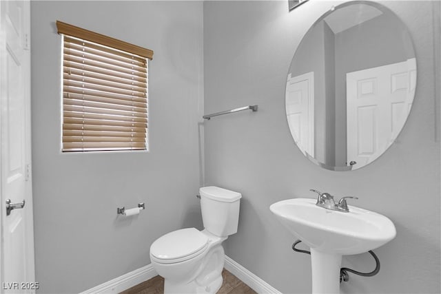 8658 Tom Noon Ave Unit 103, Las Vegas, NV 89178 - half bath with toilet and wood finished floors