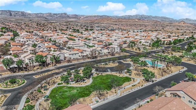 8658 Tom Noon Ave Unit 103, Las Vegas, NV 89178 - aerial view of property and surrounding area with a mountainous background and nearby suburban area