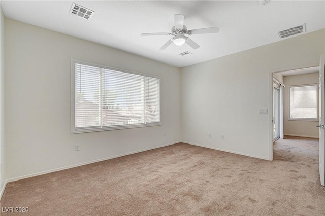 2508 Chasma Dr, Henderson, NV 89044 - carpeted empty room featuring plenty of natural light and ceiling fan