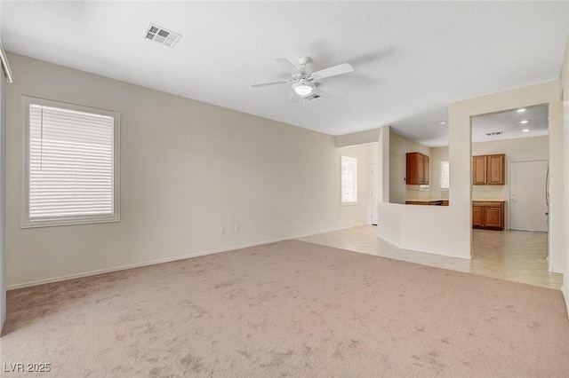 2508 Chasma Dr, Henderson, NV 89044 - unfurnished living room with light carpet, ceiling fan, and recessed lighting