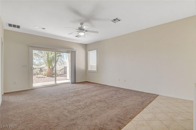 2508 Chasma Dr, Henderson, NV 89044 - unfurnished room featuring ceiling fan, light carpet, and light tile patterned floors