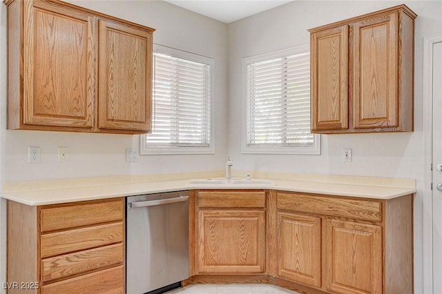 2508 Chasma Dr, Henderson, NV 89044 - kitchen with stainless steel dishwasher, healthy amount of natural light, and light countertops