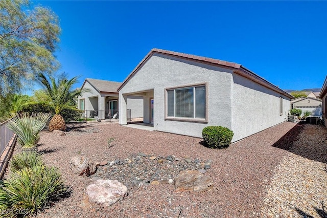 2508 Chasma Dr, Henderson, NV 89044 - rear view of property featuring stucco siding