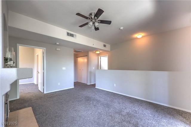 9050 W Warm Springs Rd Unit 2062, Las Vegas, NV 89148 - unfurnished room with carpet, a ceiling fan, and a smoke detector