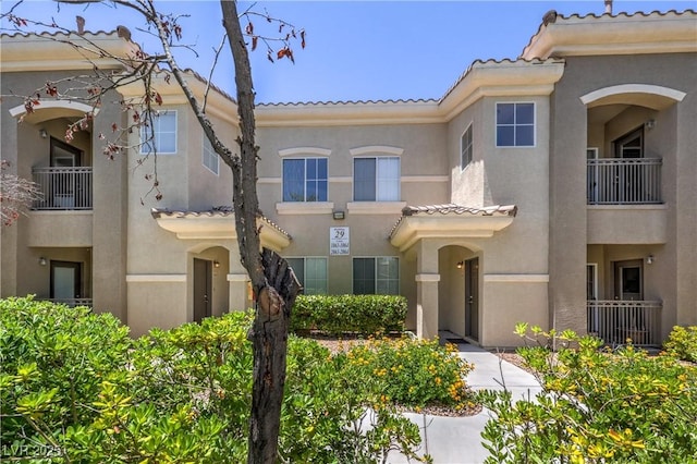 9050 W Warm Springs Rd Unit 2062, Las Vegas, NV 89148 - multi unit property featuring a tile roof and stucco siding