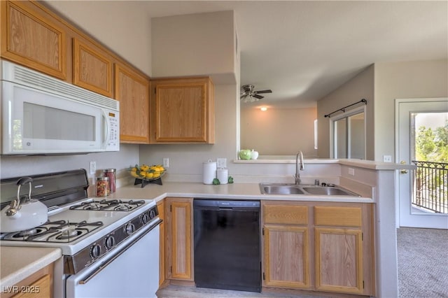 9050 W Warm Springs Rd Unit 2062, Las Vegas, NV 89148 - kitchen featuring white appliances, light countertops, a ceiling fan, and a peninsula