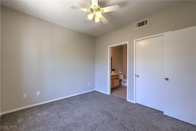 9050 W Warm Springs Rd Unit 2062, Las Vegas, NV 89148 - unfurnished bedroom featuring carpet floors, connected bathroom, and ceiling fan