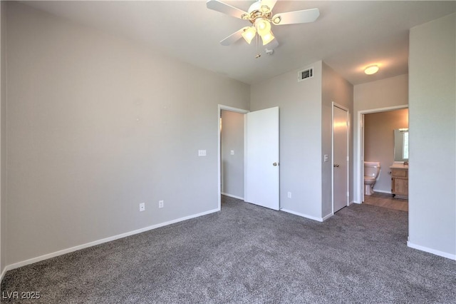 9050 W Warm Springs Rd Unit 2062, Las Vegas, NV 89148 - unfurnished bedroom with carpet floors, ensuite bathroom, and a ceiling fan