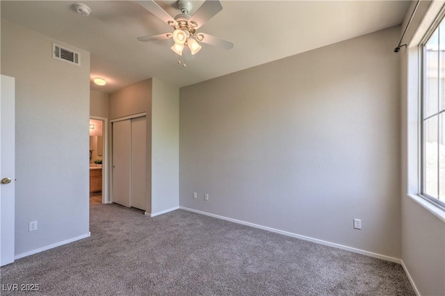 9050 W Warm Springs Rd Unit 2062, Las Vegas, NV 89148 - unfurnished bedroom featuring carpet floors, a closet, and a ceiling fan