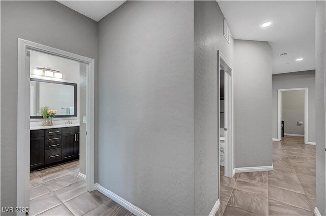 2433 Amatrice St, Henderson, NV 89044 - corridor with baseboards