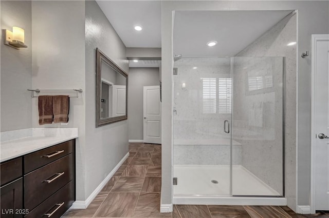 2433 Amatrice St, Henderson, NV 89044 - bathroom featuring a shower stall, vanity, and recessed lighting