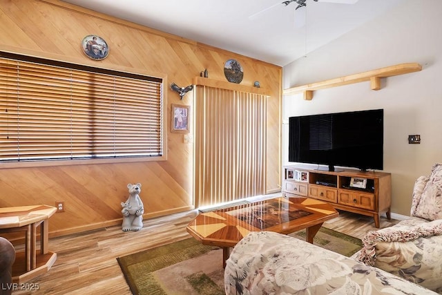 816 Sandsprings St, Henderson, NV 89011 - living room featuring wood finished floors, ceiling fan, and wood walls