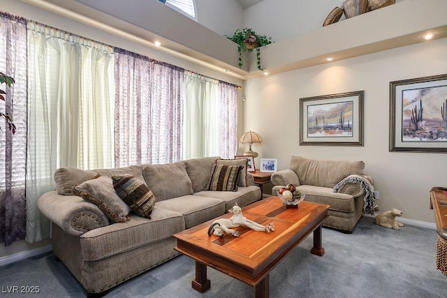 816 Sandsprings St, Henderson, NV 89011 - living area featuring carpet floors and a towering ceiling