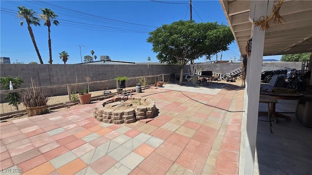 2965 Palma Vista Cir, Las Vegas, NV 89169 - fenced backyard with a fire pit, a patio area, and outdoor dining area