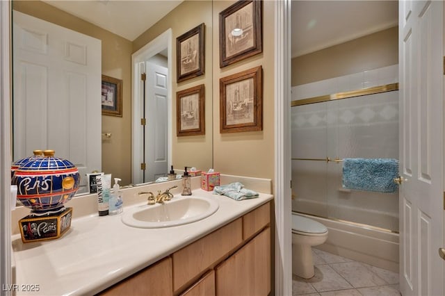 1704 River Birch St, Las Vegas, NV 89117 - full bath with vanity, tile patterned floors, and shower / bath combination with glass door