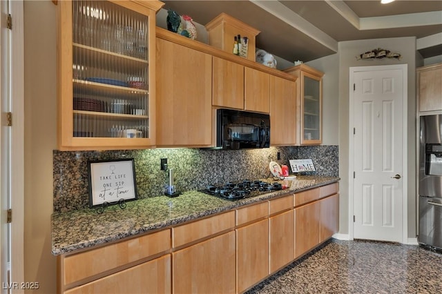 1704 River Birch St, Las Vegas, NV 89117 - kitchen featuring black appliances, light stone counters, backsplash, glass insert cabinets, and granite tiled floors