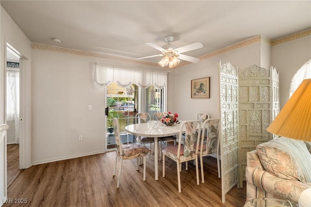7950 W Flamingo Rd Unit 1024, Las Vegas, NV 89147 - dining room featuring wood finished floors and ceiling fan