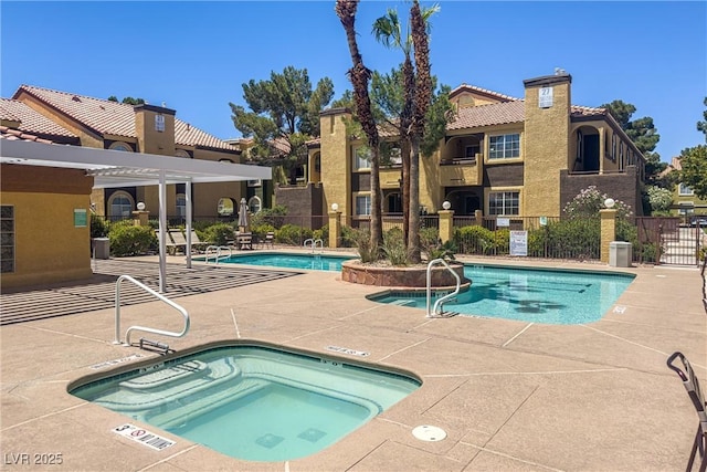 7950 W Flamingo Rd Unit 1024, Las Vegas, NV 89147 - community pool featuring a community hot tub and a patio