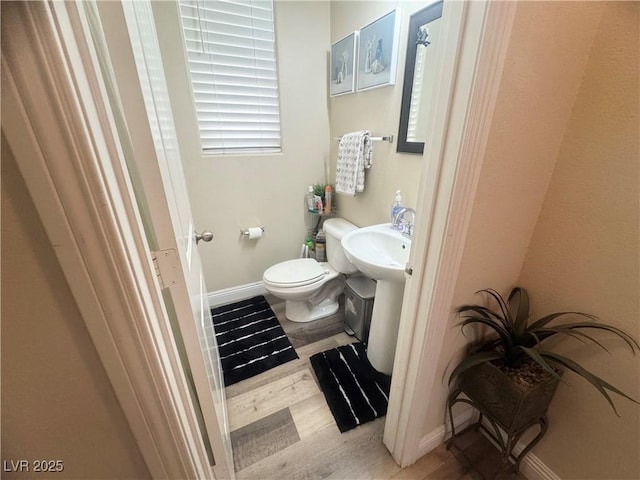6922 Majestic Palm Dr, Las Vegas, NV 89122 - bathroom featuring toilet and wood finished floors