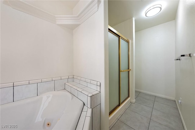 901 E Jaybird St, Pahrump, NV 89048 - bathroom featuring a stall shower, a tub with jets, and tile patterned flooring