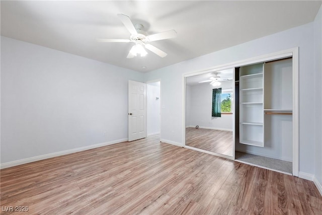 901 E Jaybird St, Pahrump, NV 89048 - unfurnished bedroom with light wood-style flooring, a closet, and a ceiling fan