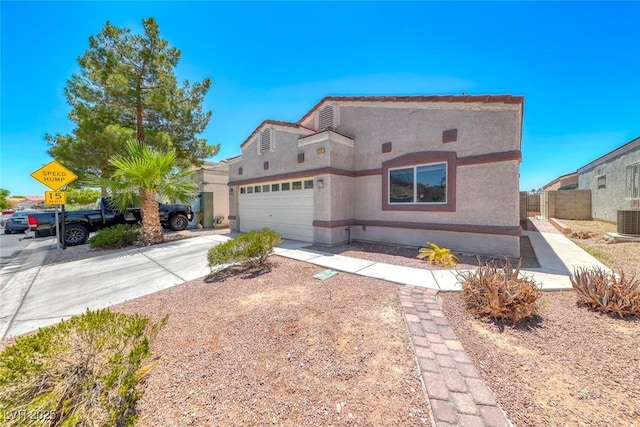 1717 Dwayne Stedman Ave, Las Vegas, NV 89106 - view of front of property with a garage, concrete driveway, and stucco siding