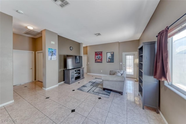 1717 Dwayne Stedman Ave, Las Vegas, NV 89106 - living area featuring plenty of natural light and light tile patterned flooring