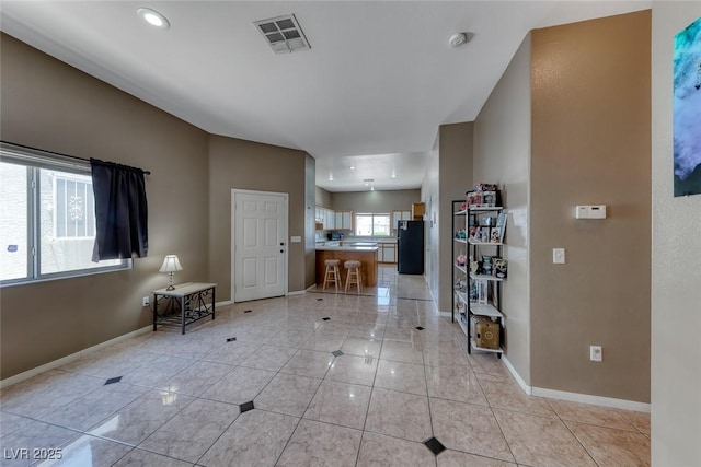 1717 Dwayne Stedman Ave, Las Vegas, NV 89106 - entrance foyer featuring light tile patterned floors and recessed lighting