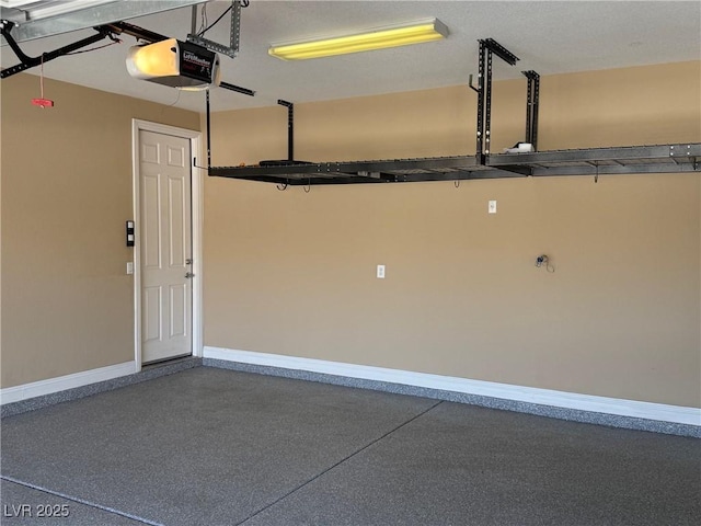 585 Via Alhambra, Las Vegas, NV 89123 - garage with a garage door opener and baseboards