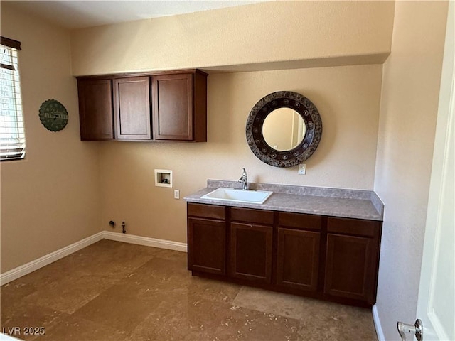 585 Via Alhambra, Las Vegas, NV 89123 - laundry room featuring hookup for a washing machine and cabinet space