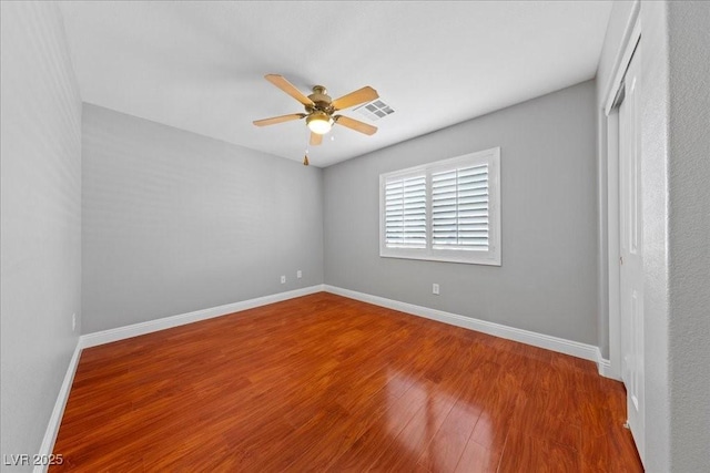4029 Ricebird Way N, Las Vegas, NV 89084 - empty room with ceiling fan and wood finished floors