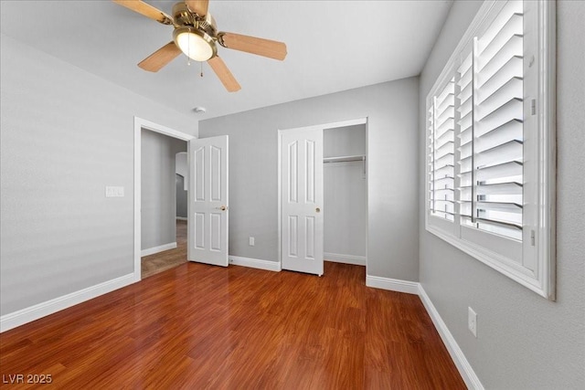 4029 Ricebird Way N, Las Vegas, NV 89084 - unfurnished bedroom with wood finished floors, a closet, and a ceiling fan