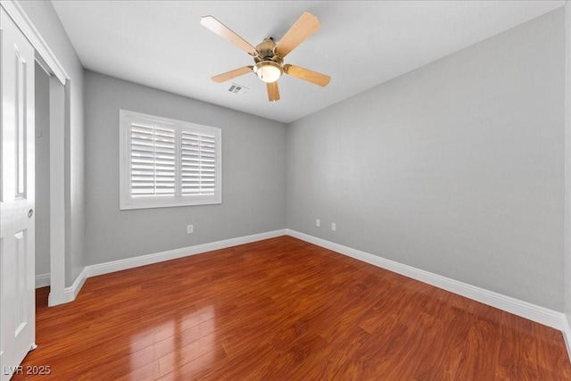4029 Ricebird Way N, Las Vegas, NV 89084 - unfurnished bedroom with wood finished floors, a closet, and a ceiling fan