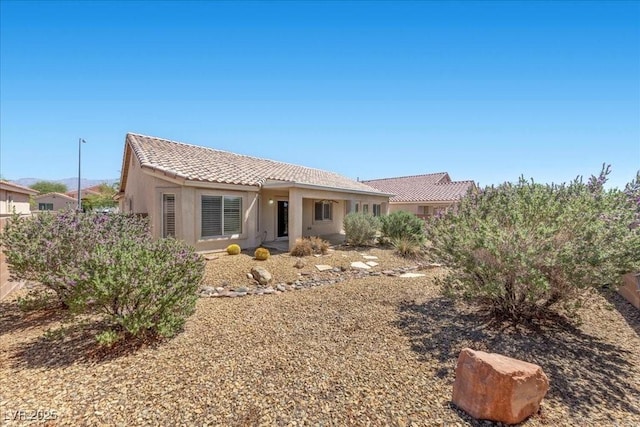 4029 Ricebird Way N, Las Vegas, NV 89084 - view of front of house with a tile roof and stucco siding