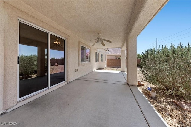 4029 Ricebird Way N, Las Vegas, NV 89084 - fenced backyard with ceiling fan and a patio
