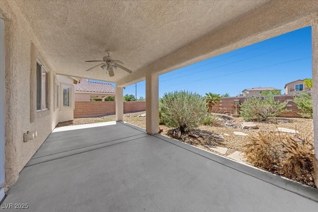 4029 Ricebird Way N, Las Vegas, NV 89084 - fenced backyard featuring a ceiling fan and a patio area
