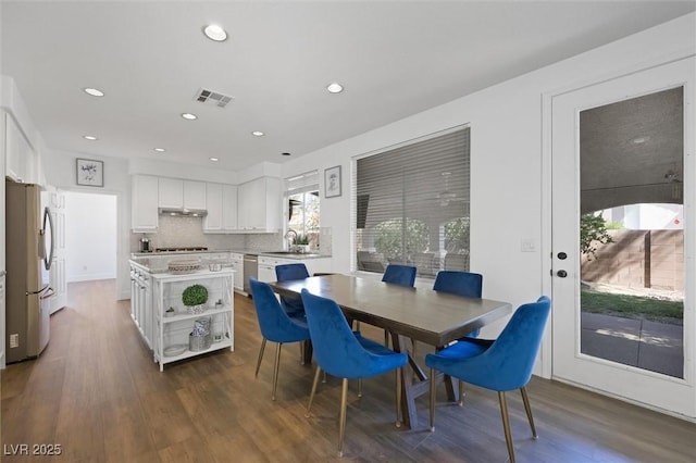 2229 Armacost Dr, Henderson, NV 89074 - dining space with dark wood-style flooring and recessed lighting