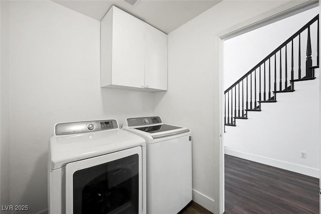 2229 Armacost Dr, Henderson, NV 89074 - laundry area with washing machine and dryer, cabinet space, and dark wood-style flooring