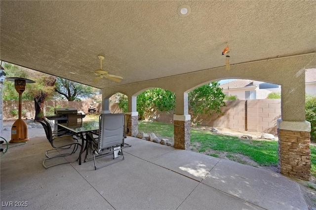 2229 Armacost Dr, Henderson, NV 89074 - fenced backyard with outdoor dining space, a patio, and a ceiling fan