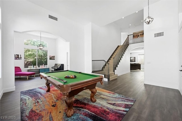 2229 Armacost Dr, Henderson, NV 89074 - rec room featuring arched walkways, wood finished floors, a towering ceiling, billiards, and recessed lighting