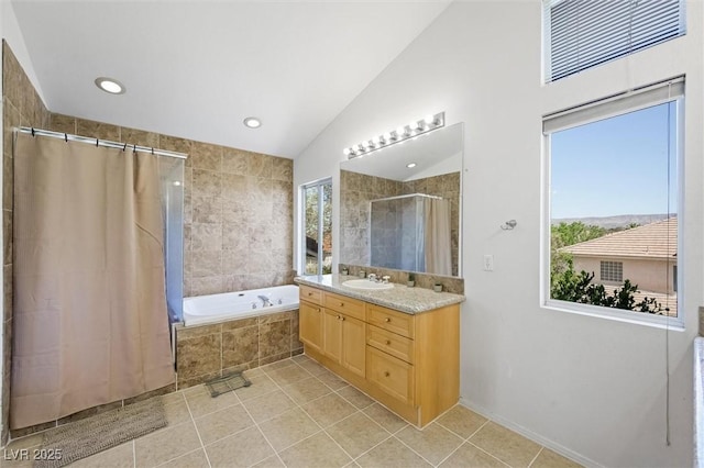 2229 Armacost Dr, Henderson, NV 89074 - full bath with tiled shower, a bath, tile patterned flooring, vanity, and vaulted ceiling