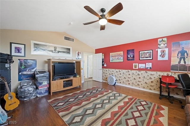 2229 Armacost Dr, Henderson, NV 89074 - living area featuring lofted ceiling, wood finished floors, ceiling fan, a desk, and wallpapered walls