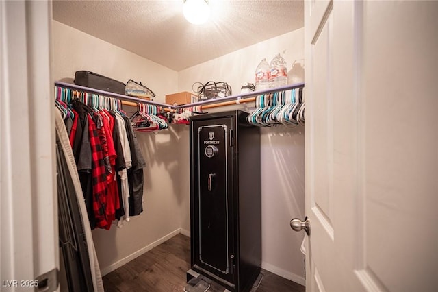 7231 Sequoia Springs Dr, Las Vegas, NV 89147 - spacious closet featuring wood finished floors