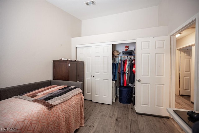 7231 Sequoia Springs Dr, Las Vegas, NV 89147 - bedroom featuring wood finished floors and a closet