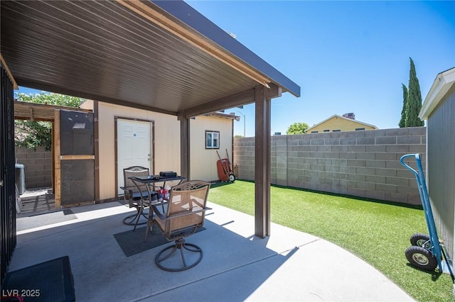 7231 Sequoia Springs Dr, Las Vegas, NV 89147 - fenced backyard featuring a patio area